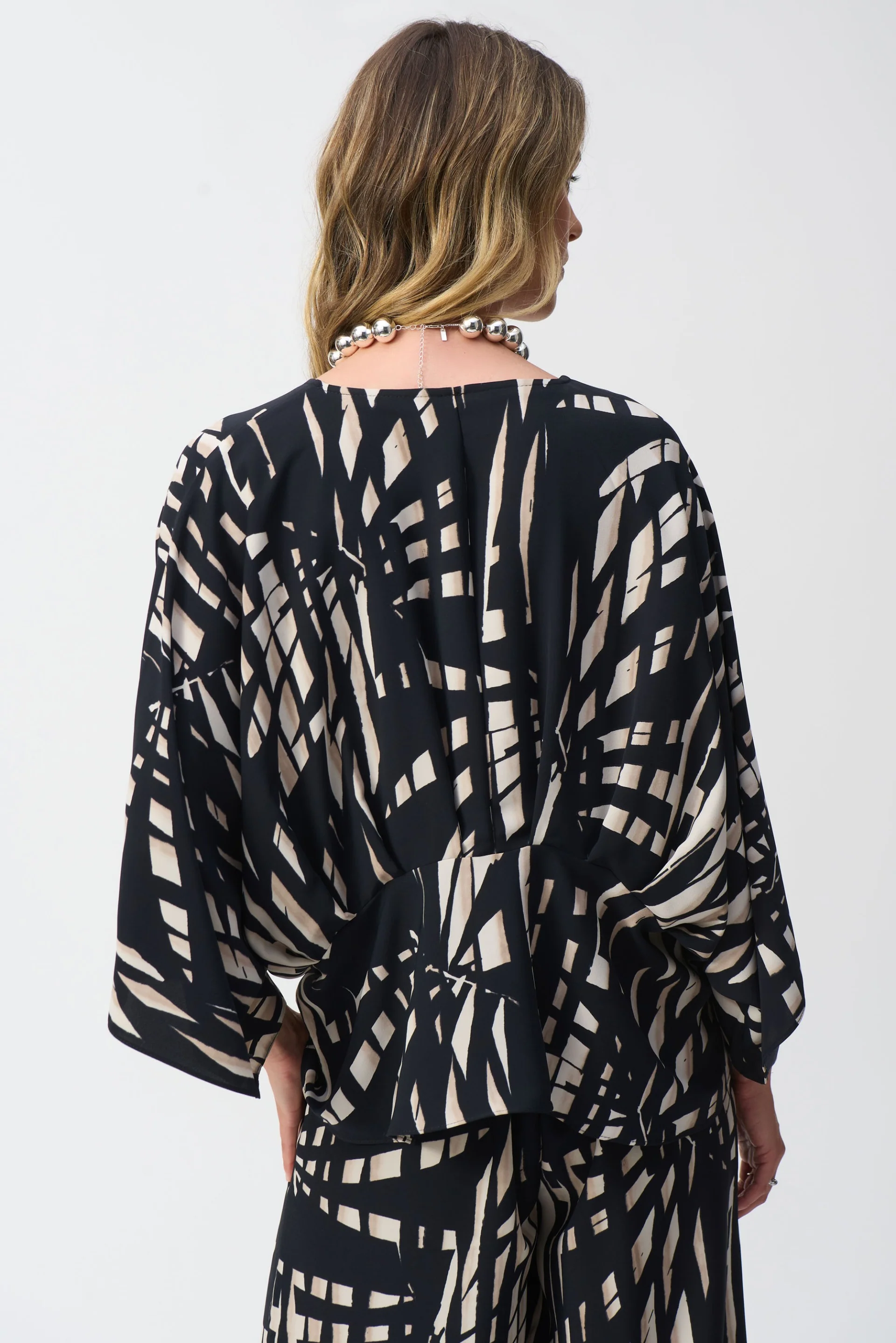 Joseph Ribkoff Black/Multi Tropical Print Peplum Top Style 251047 - Image 3
